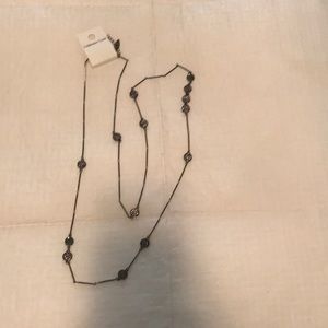 Long necklace with tags